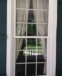 white window trim painted by home painters