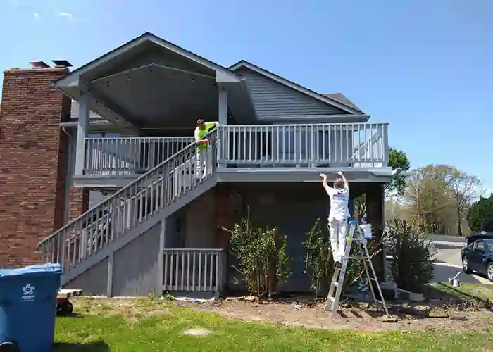 deck staining of two-story home in joplin